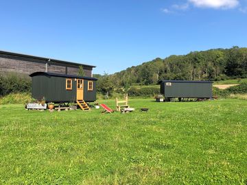 Two huts facing in opposite directions