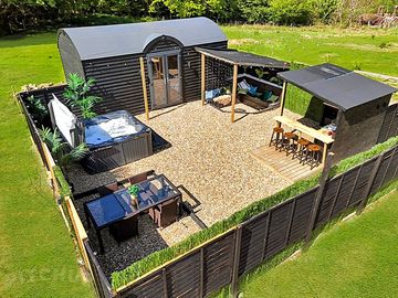 Private grounds with a chill-out area and outdoor kitchen