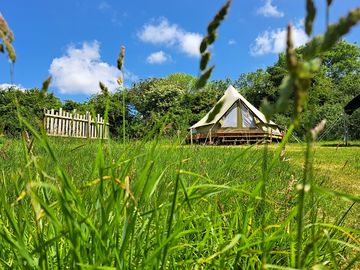 Bell tent on a level platform