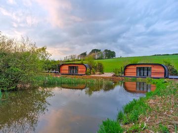 View across the lake to both pods