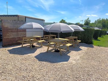 Picnic tables with parasols