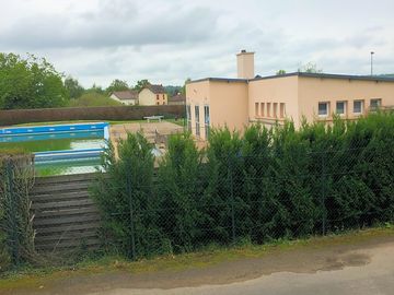 Swimming pool available in luzy fairly close to the campsite