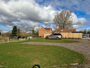 Fully-serviced hardstanding and grass touring pitches