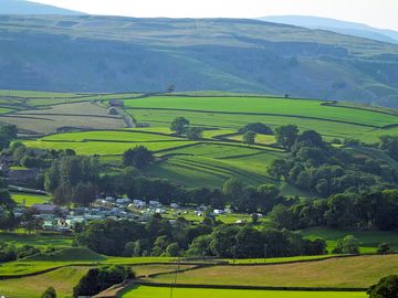 View of the site from Langcliffe Scar across the valley