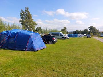 Standard camping pitches on ranch field.