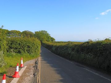 Site entrance facing south towards caswell bay