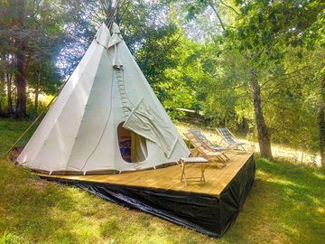 Tipi on a wooden deck