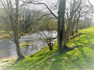 The river dee runs by the site