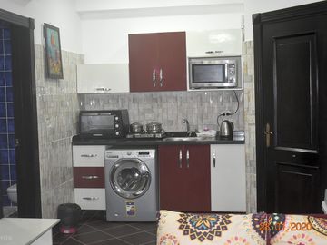 Kitchen is fully equipped with oven, fridge, and kettle and all you need to prepare your own meals.