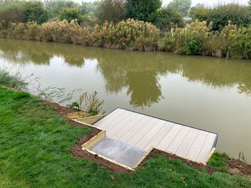 Private fishing in front of each glamping pod