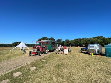 Tractor tour collection from campsite reception