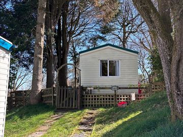 The caravan is in a quiet area by the river