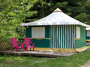Large tent on a wooden deck