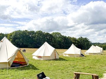 Empty bell tents in a line