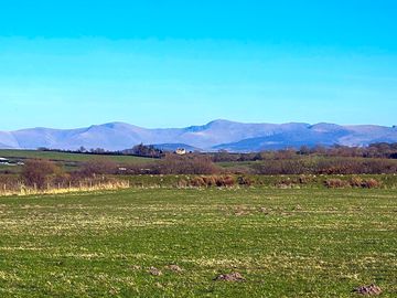 View of Snowdonia from the site