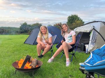 Kids love to enjoy a campfire and roast marshmallows while camping, with lots of space to spread out