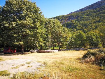 Grass and earth touring caravan pitch