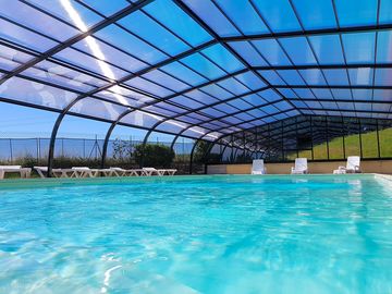 Covered and heated swimming pool