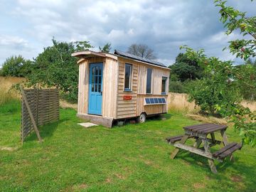 The Bunkie sleeps 4 heated by passive solar and air heater. Showers and tiolet block 30meters away.