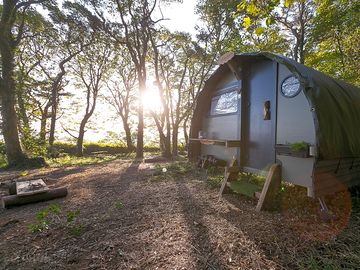 Sun rising behind the pod