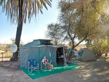 Shaded pitch under the palm trees