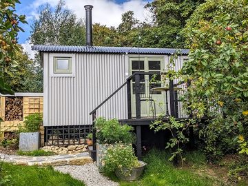 Surrounded by nature, the shepherd's hut is set in a secluded private orchard