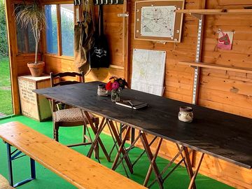 The cook hut comes complete with cooking and dining equipment
