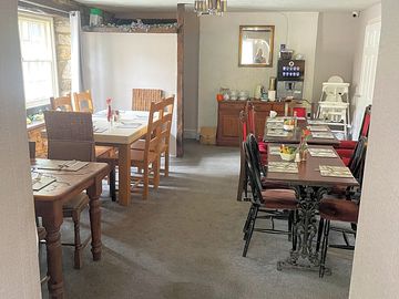 Dining area inside pub with high chairs
