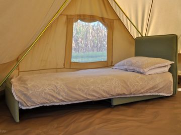 Single bed which can fold away during the day