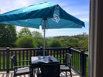 Seating on the deck with view across brighton