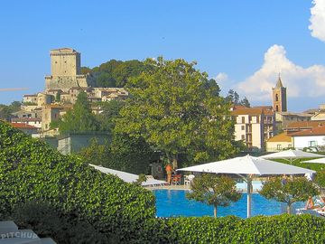 The pool presided over by the castle
