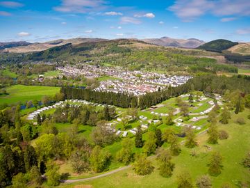 Aerial view of Callander Woods, with Callander and the Trossachs in the background