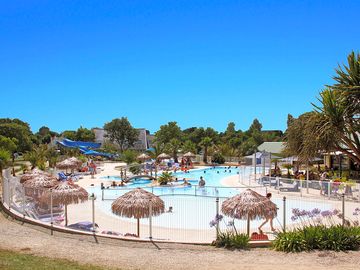 View of the pool with waterslides