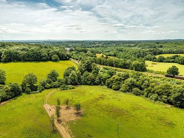 Aerial view of the site and railway track