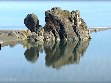Turtle Rock on a slow summer day. Grab sunblock and enjoy the beach, just near the resort.