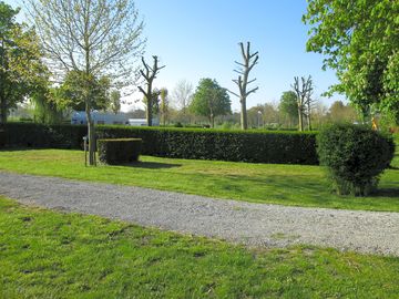 Pitches separated by trees and hedges