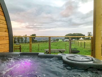 Visitor image, relaxing in the hot tub