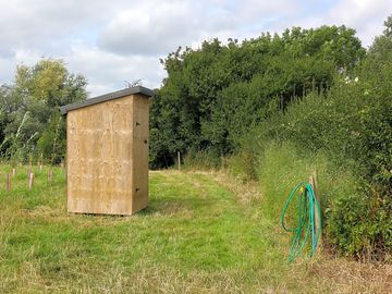 We have a compost toilet and water available onsite