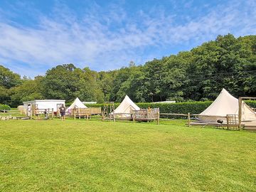 Some of our bell tents are by the field