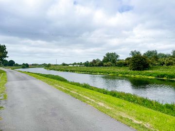 Road and river alongside site