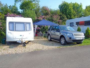 Site quite compact so motor movers helped position caravan.but plenty of space for 550 caravan.