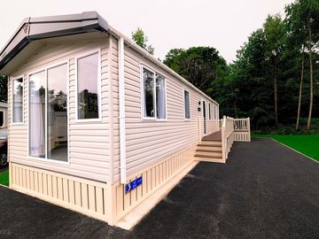 Caravan with private wrap-around decking