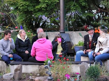 Camp guests around the fire