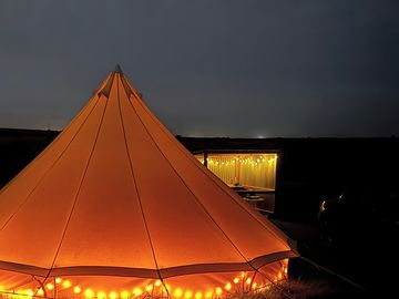 Glamping bell tent at night