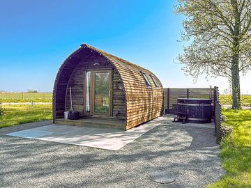 Outside space with hot tub