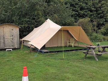 Fully furnished tent on raised platform