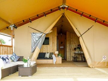 Premium deluxe safari tent with a spacious verandah