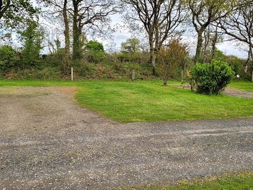 Squirrel dray pitch, with hardstanding and grass