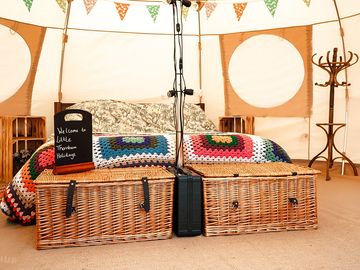 Kingsize beds in each bell tent. photo taken by boutique camping.