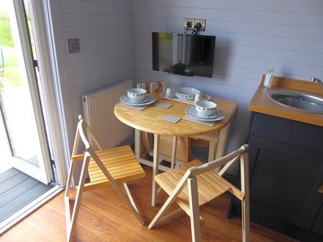 Stow away table easily converts into a great dining option